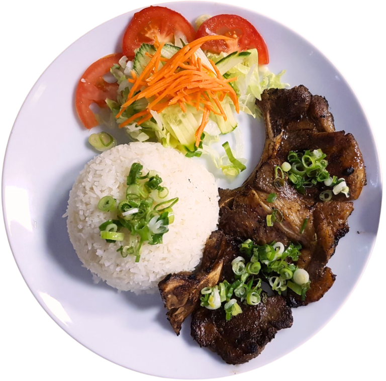 Grilled pork chop plate with jasmine rice, tomato and shredded salad
